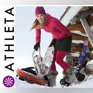 The Athleta Snow Stomper Quilted Puffer Mini Skirt Black Size 6